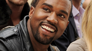 Illustration for article titled Kim Kardashian Basks in Attention While Claiming Kanye West Is Just a Friend